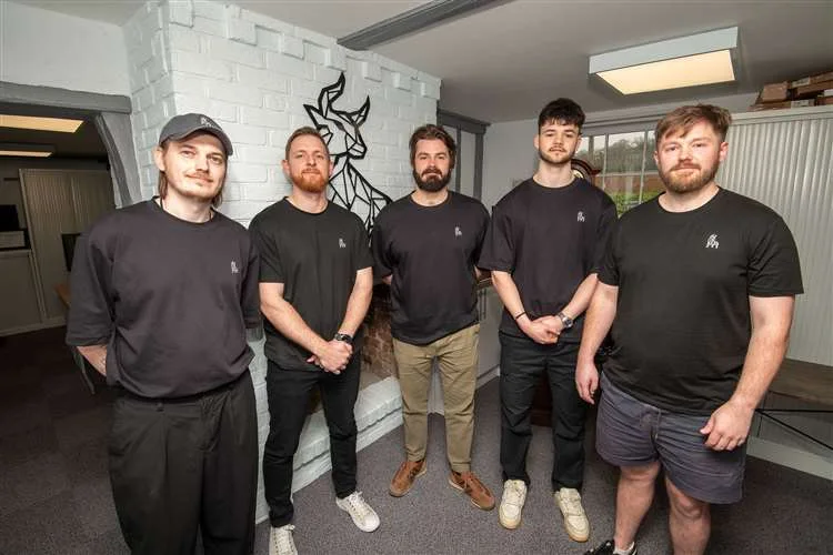 The five-person Wolfstone Digital and The Investors Centre team together in their Suffolk office