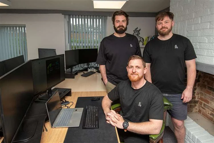 Dom Farnell, Adam Woodhead and Tom Drury of Wolfstone Digital at work in the agency office near Bury St Edmunds, Suffolk
